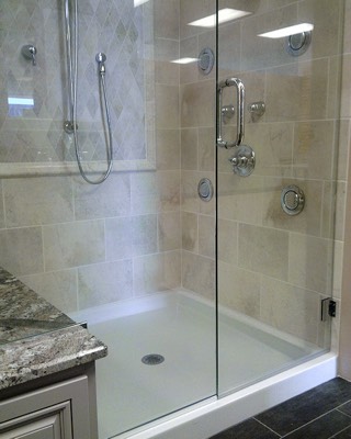 Frameless walk in shower with granite